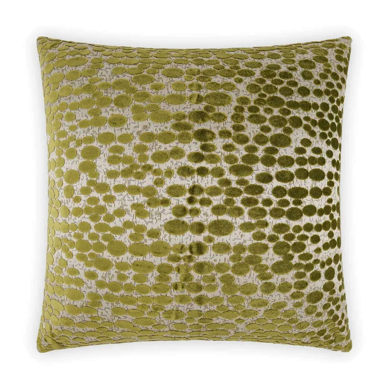 A decorative square pillow with a green and beige pattern of varying sized circles.