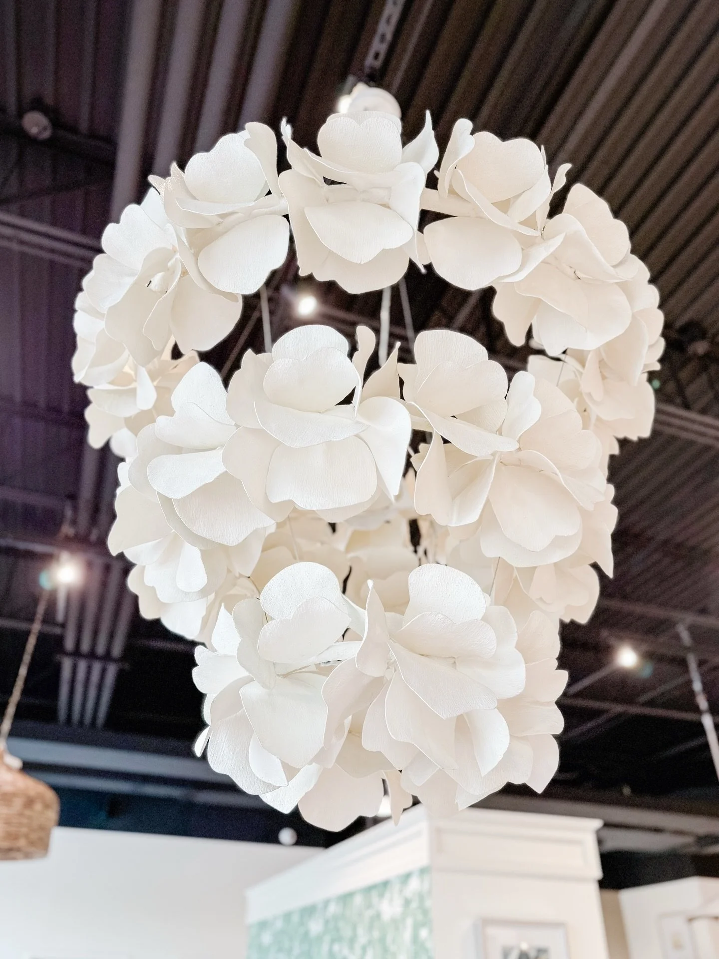 The right lighting doesn&rsquo;t just fill a room &mdash; it defines it.

The Virginia tiered chandelier is sculptural, timeless, and unapologetically statement-making. Layered ivory petals create movement and glow, transforming any space into someth