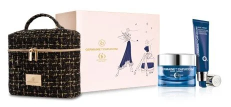 Set de productos de belleza con una bolsa de mano, caja decorativa con diseño de hadas, crema y lip balm