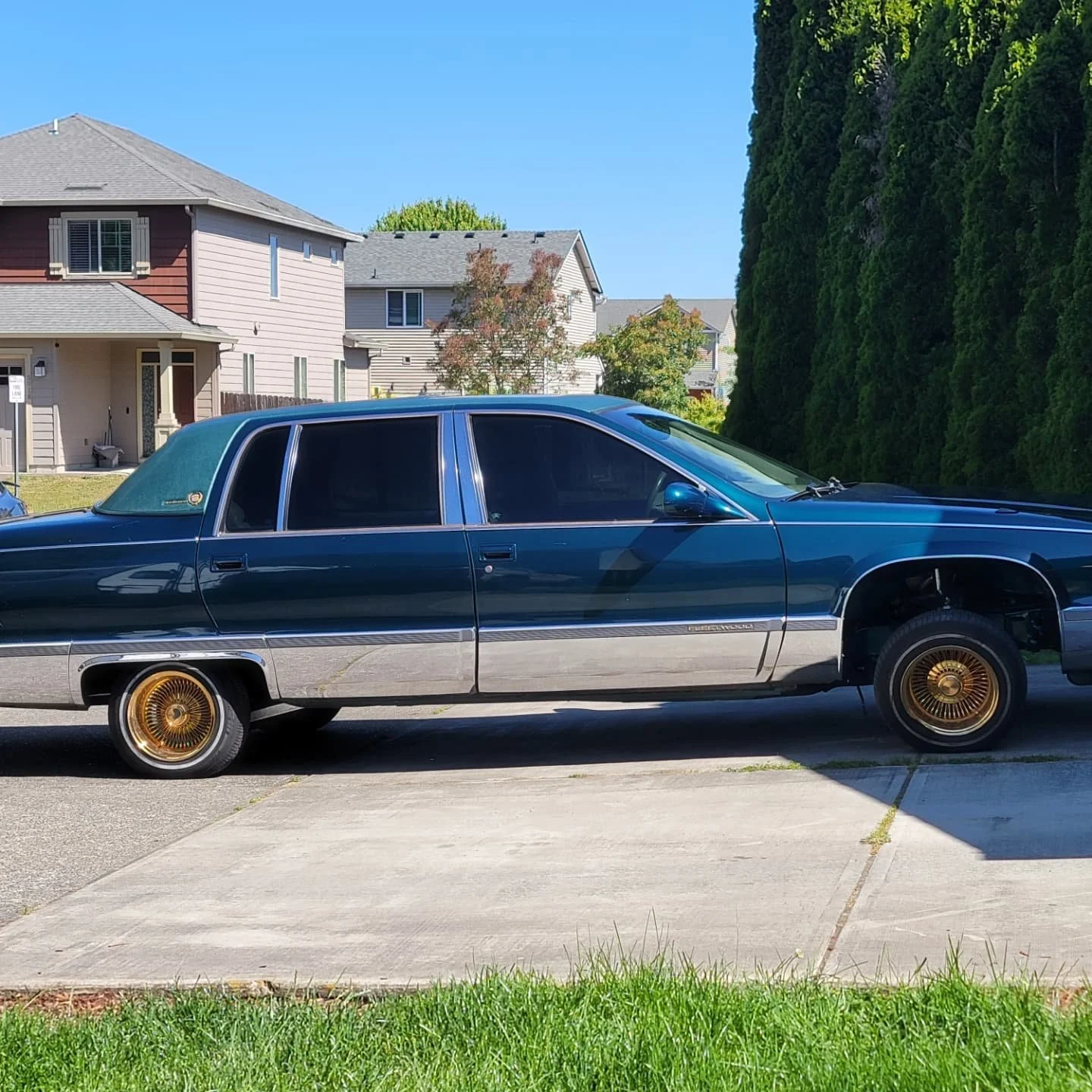 1996 Cadillac Fleetwood Brougham in Teckwrap Purple Flame. #carwrap #teckwrap #lowrider