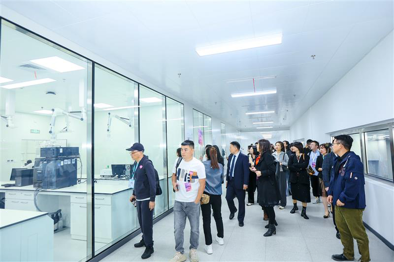 Visitors touring Wasatch Labs' custom formulation lab in China for OTC, personal care, and dietary supplement manufacturing.