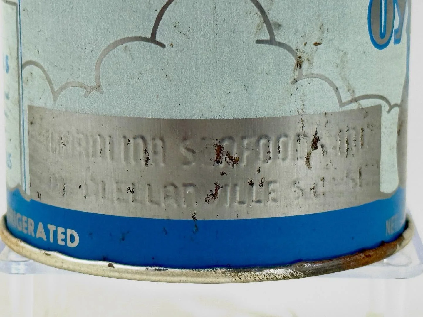 As we transition to fall and the cool nights start to lower water temperatures, our focus turns to oyster roasts. This tin, at first glance, looks like an ordinary stock can. Upon further inspection we noticed the packing house name embossed on the s
