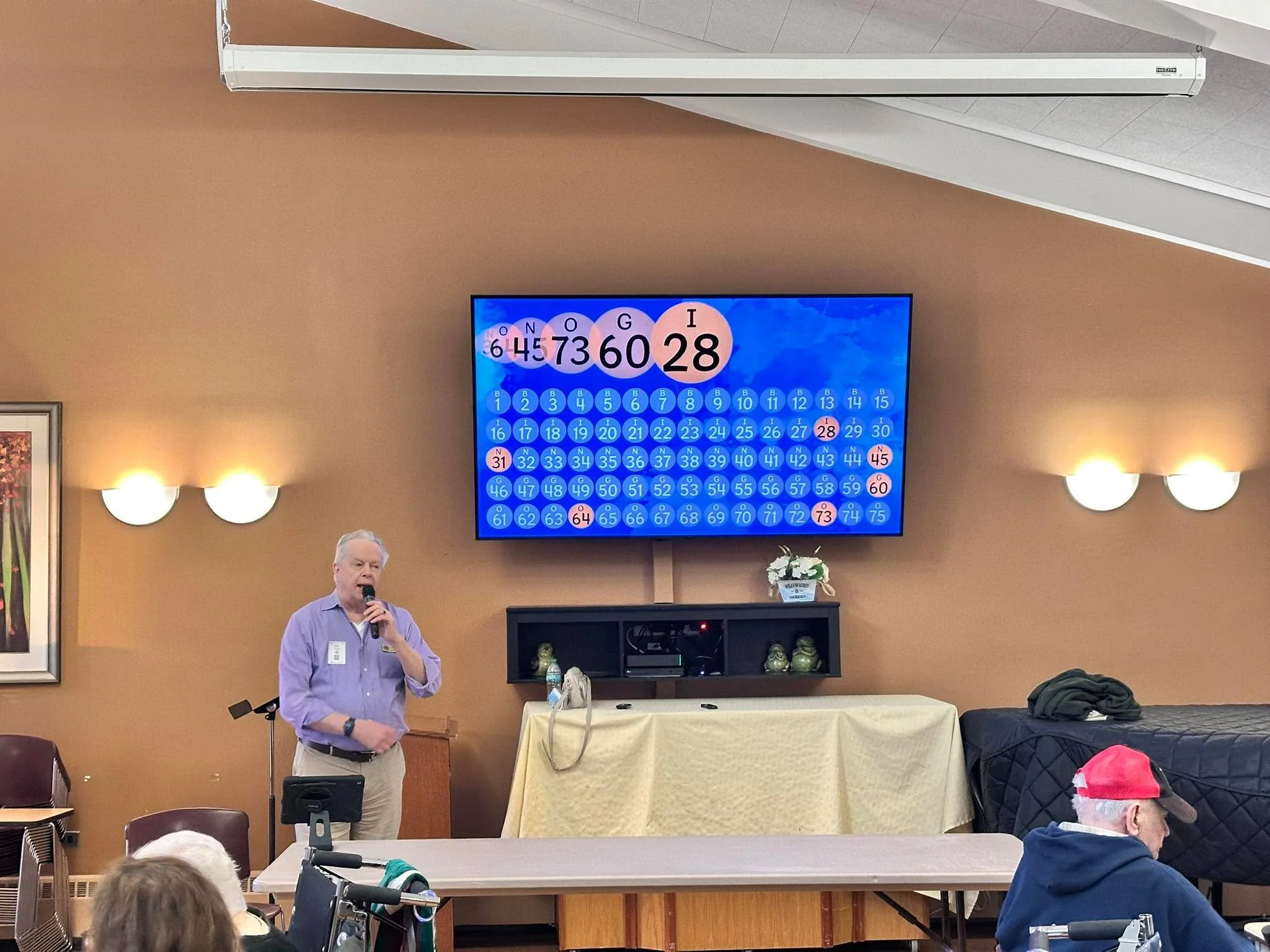 Bingo! Our monthly service project hosting bingo at the DuPage Care Center-DPCC.