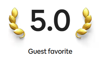 Rating of 5.0 with two gold laurel branches and the words 'Guest favorite' underneath.