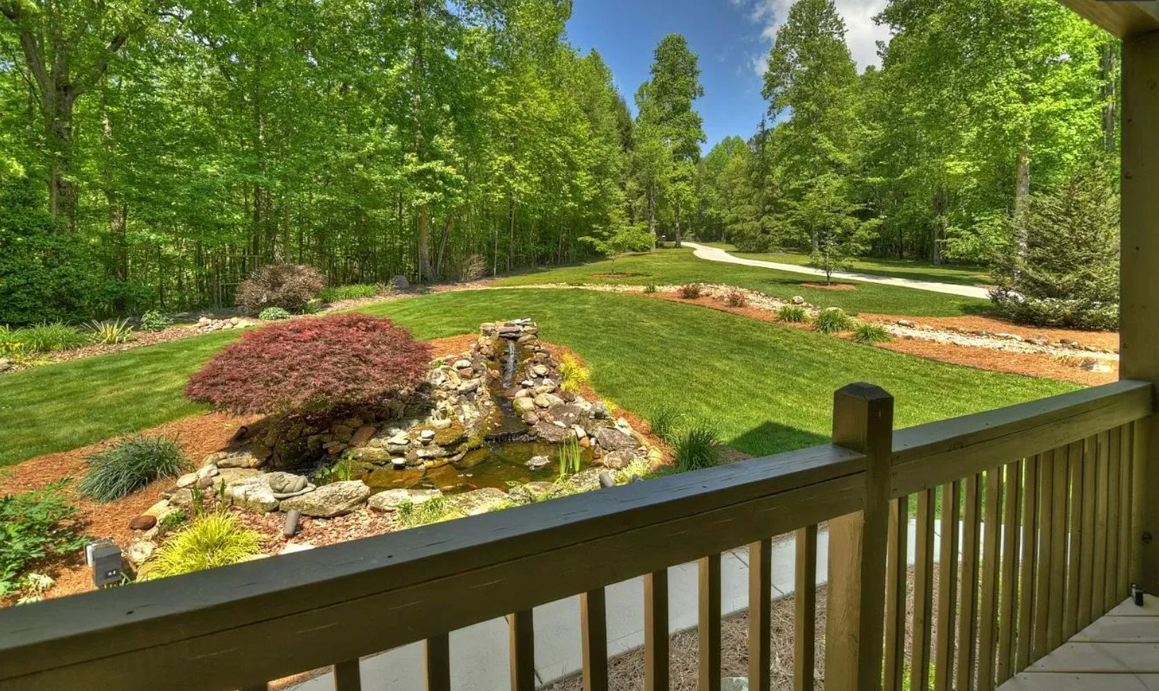 Expansive grounds featuring scenic walking paths, a private creek, a bamboo jungle, and multiple firepits. A peaceful retreat surrounded by nature, perfect for exploration and relaxation.