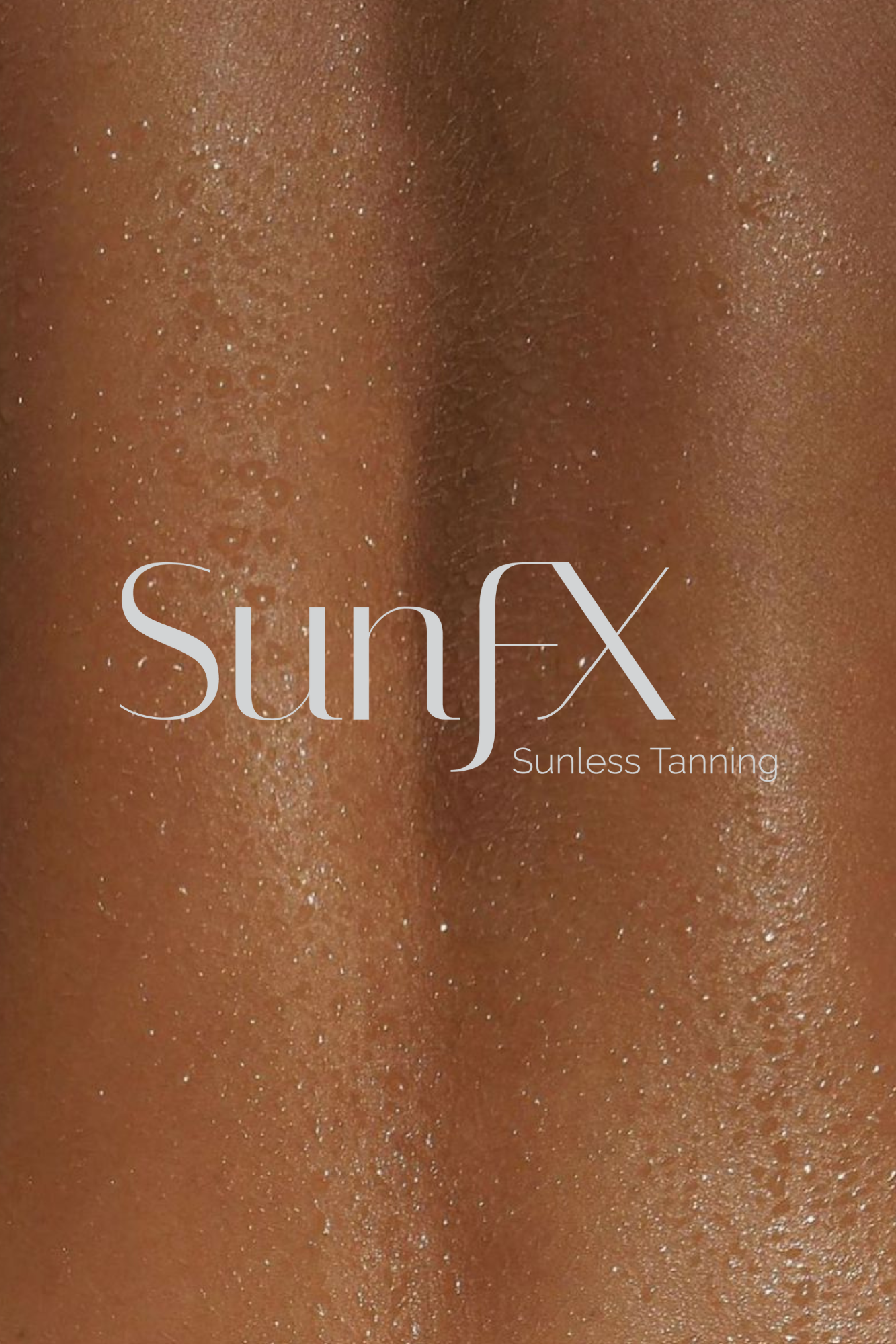 Close-up of a person's skin with a suntan, showing a shiny, bronzed texture.