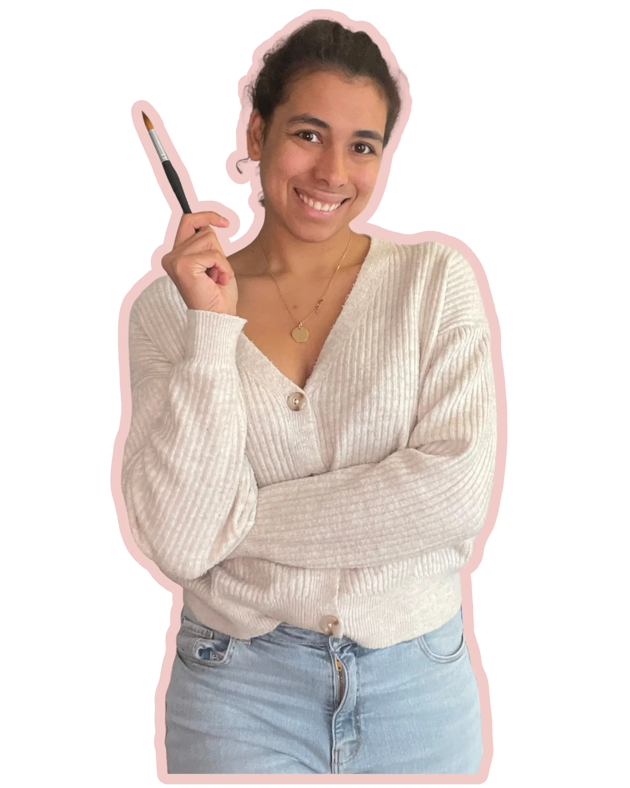 Laurie, créatrice de papeterie de mariage sur mesure à l'aquarelle, tien un pinceau