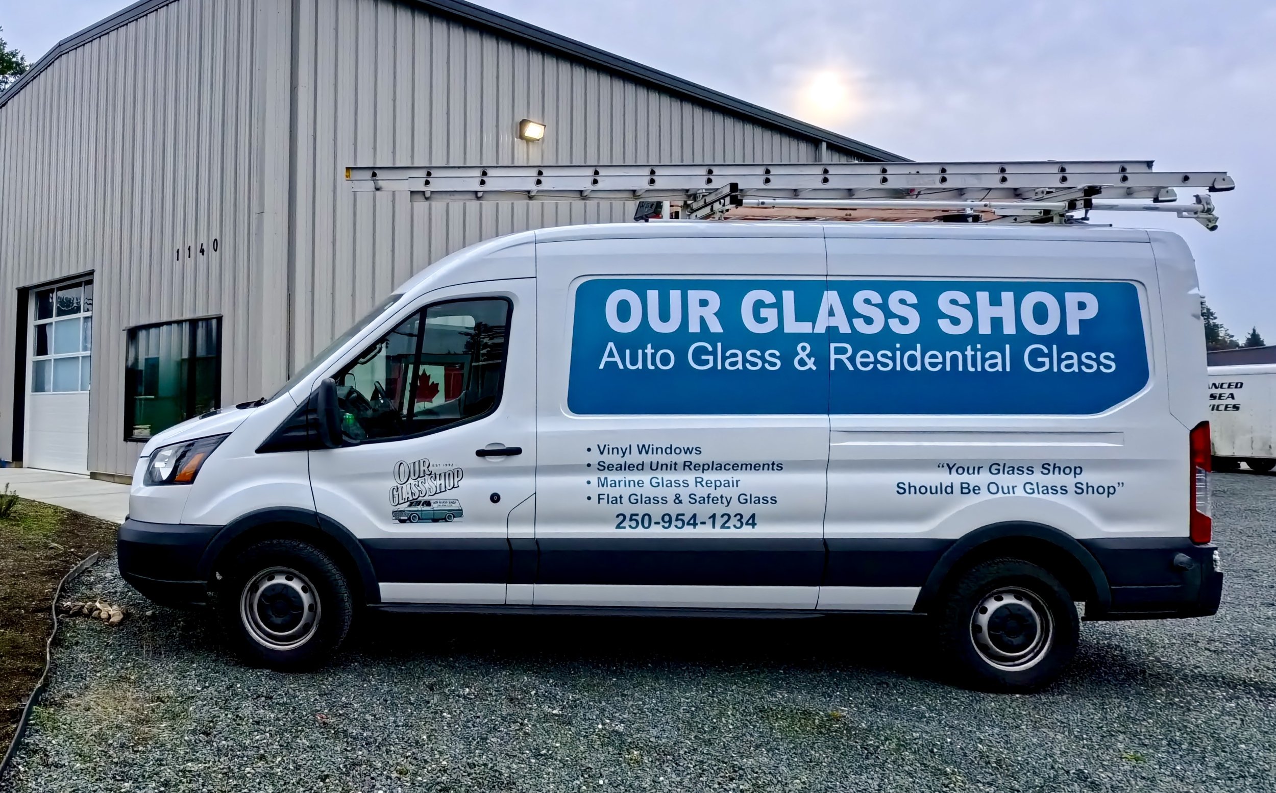 New Our Glass Shop work van in front of new shop