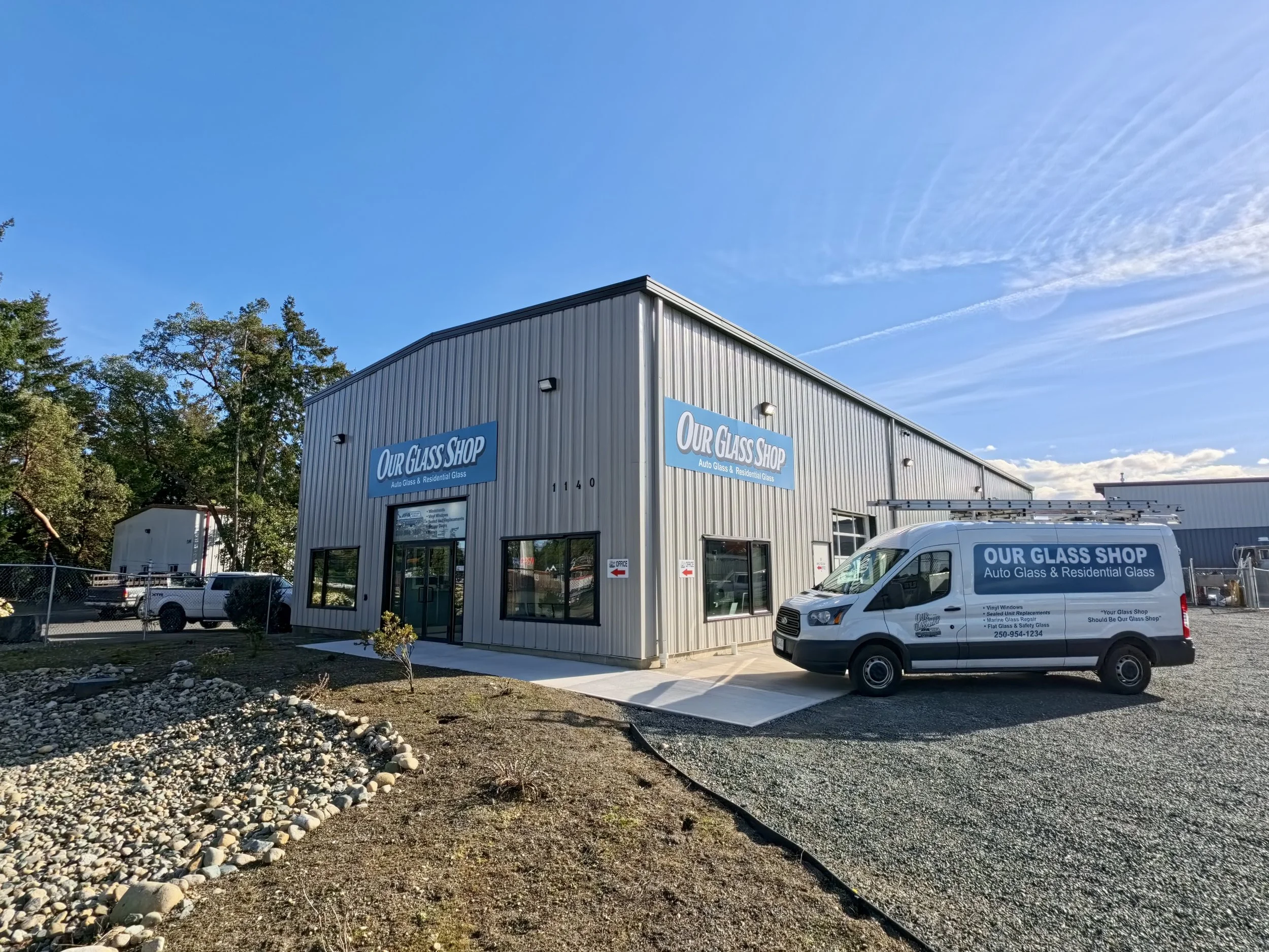 New front of shop picture with new work van