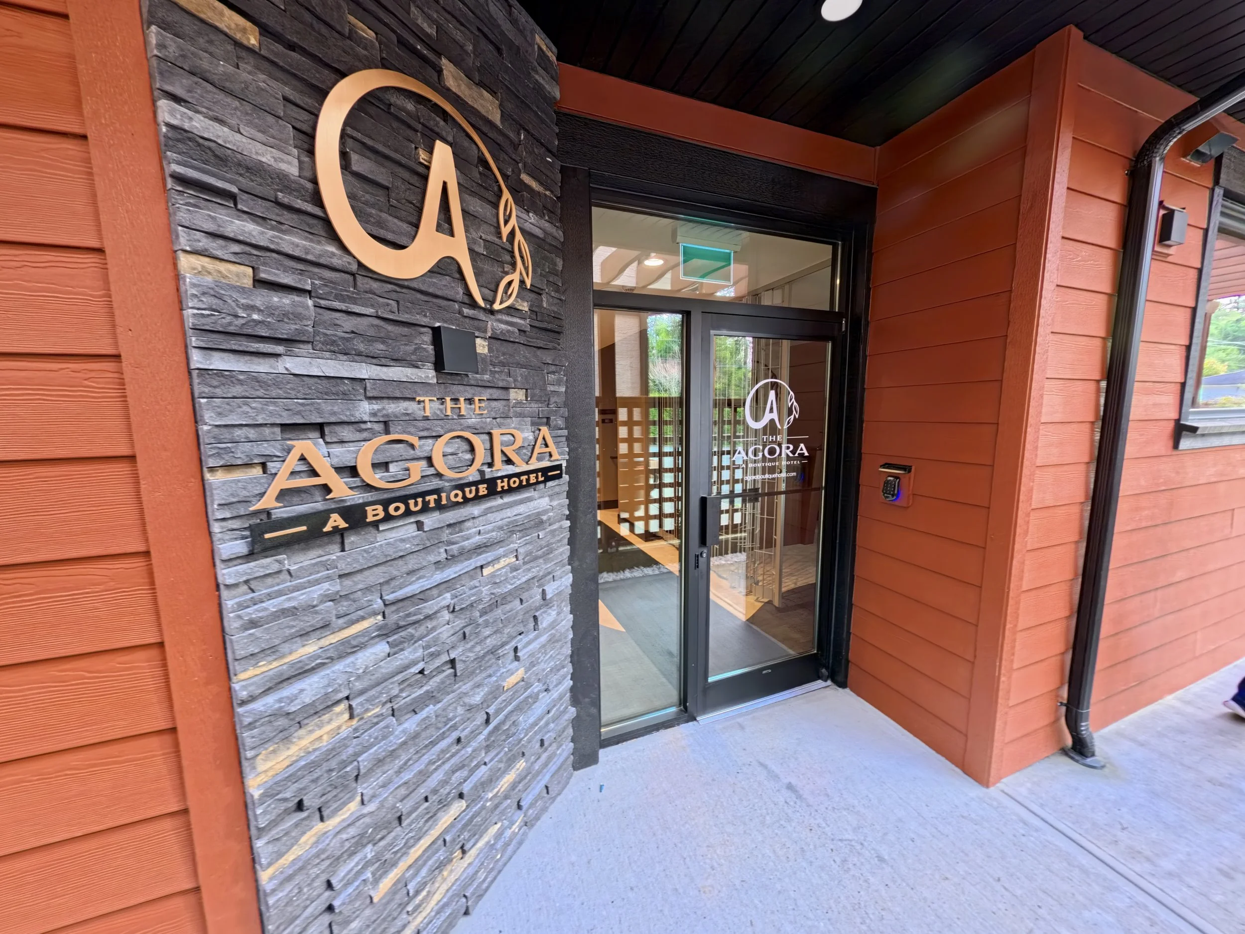 The Agora Boutique Hotel with new black commercial doors installed