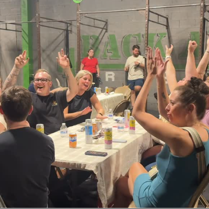 Group of people that met at an All Dogs Event celebrating winning trivia