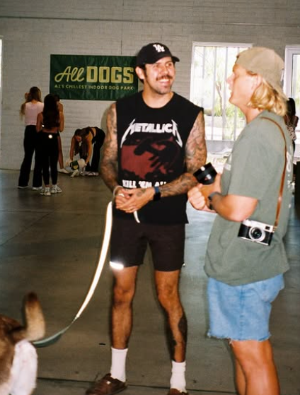 Two men meeting at an All Dogs event
