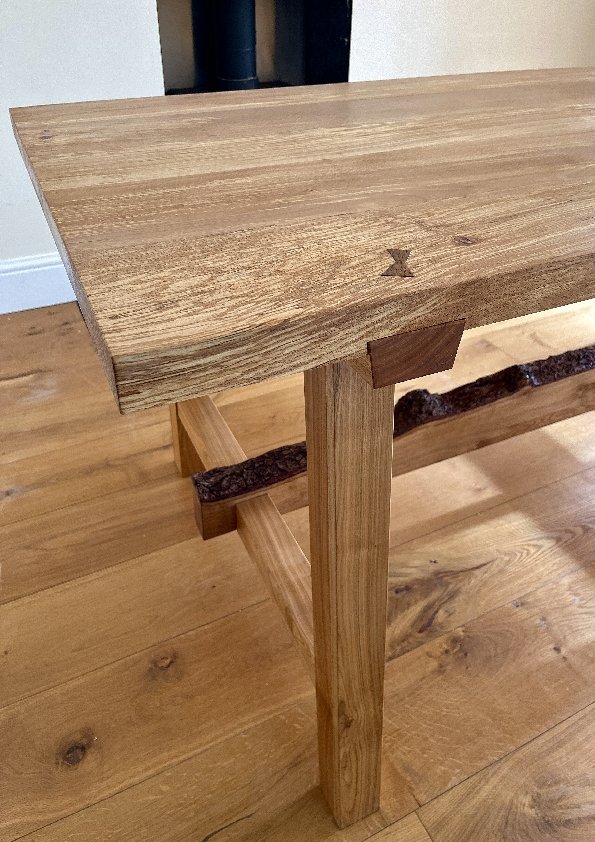 Trestle Dining Table Close Up of Cherry Wood Leg Detail