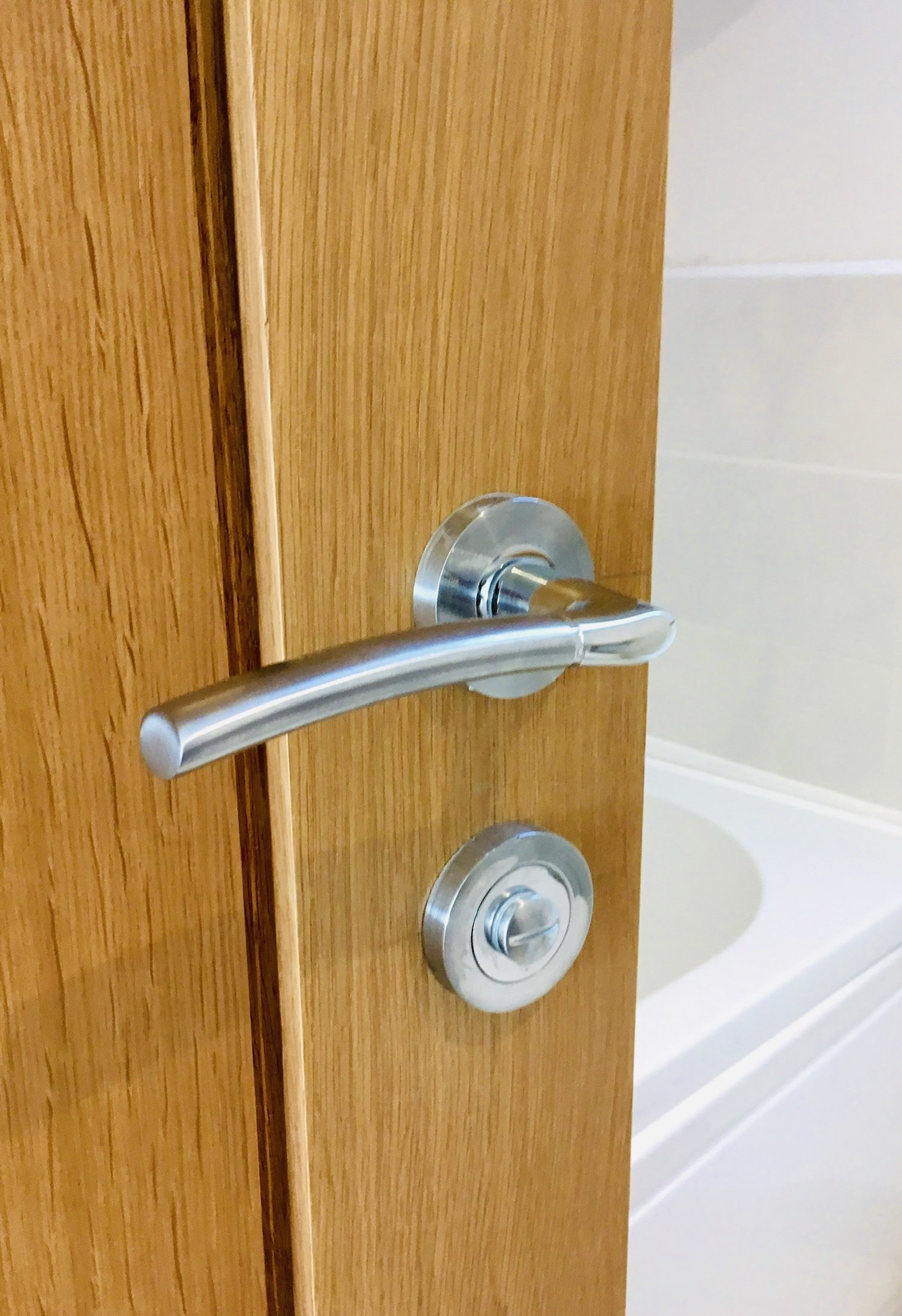 Close up of oak door and hardware