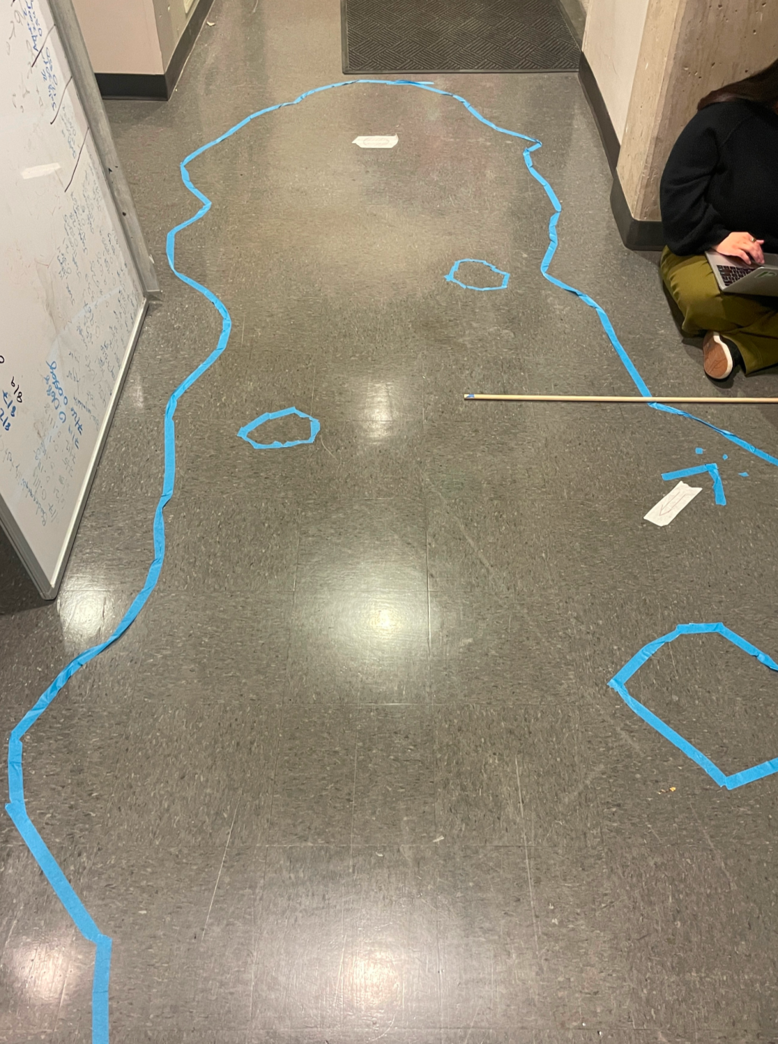 Tape markings for where things will go in cave