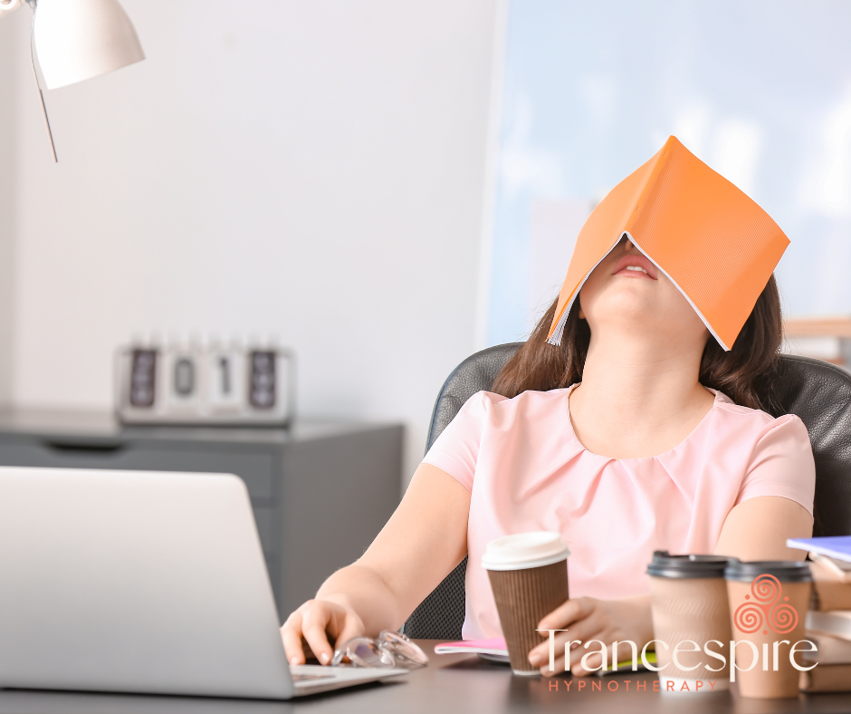 woman with book on face