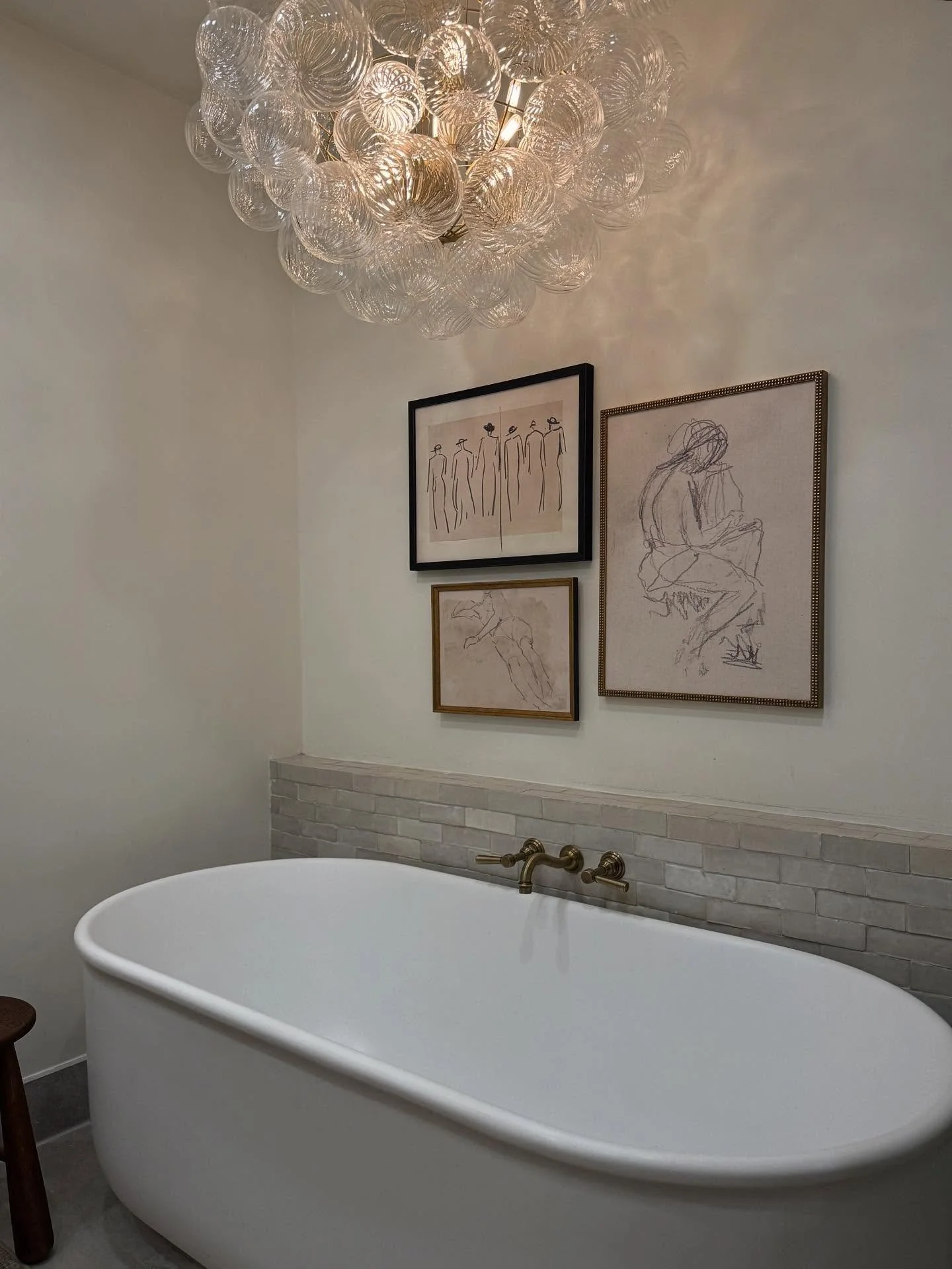Pro tip: It&rsquo;s totally acceptable to lower a chandelier over a freestanding tub. In fact, it&rsquo;s the secret no one talks about. When a fixture hangs too high, it disconnects from the moment and the whole scene falls a little&hellip; flat.

D