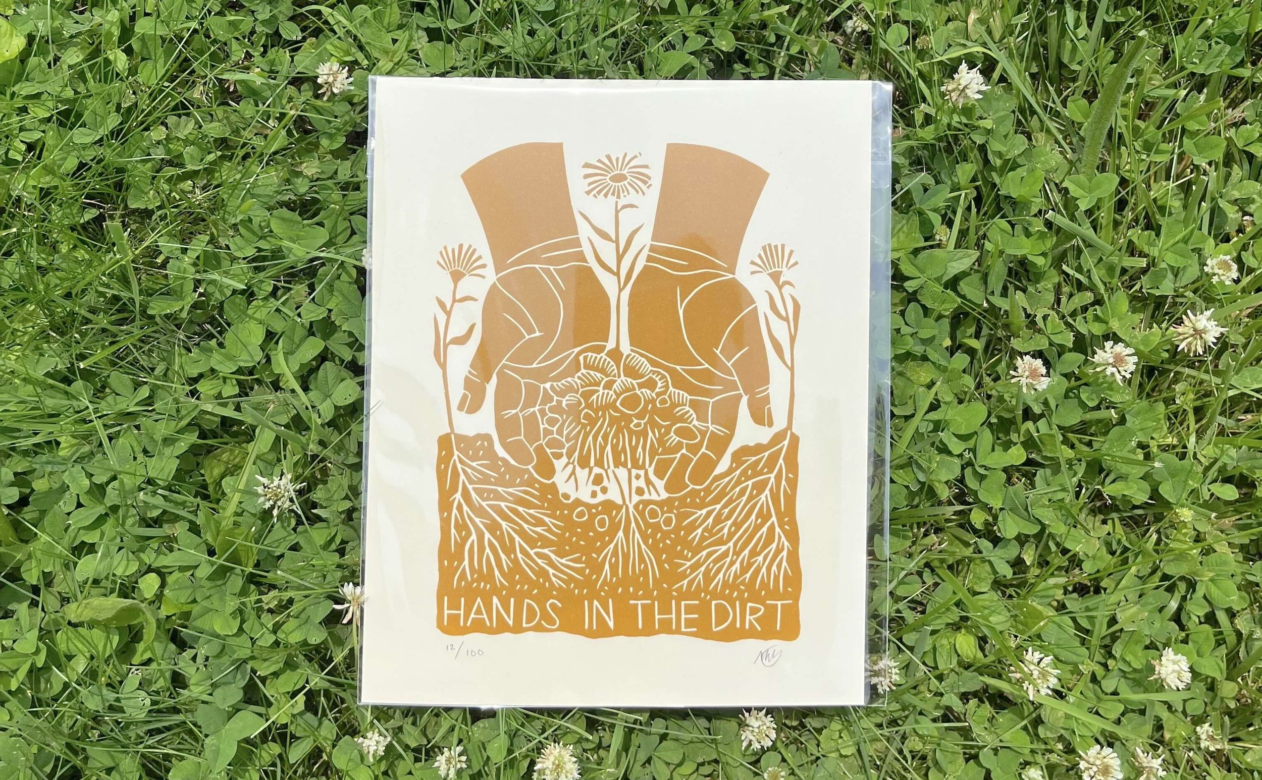 hands in the dirt yellow 1.jpg