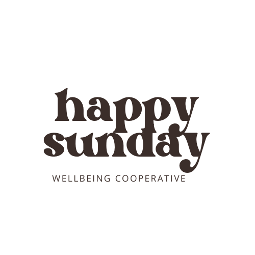 Text reading "happy sunday" with smaller text "a wellbeing cooperative" underneath on a black background.