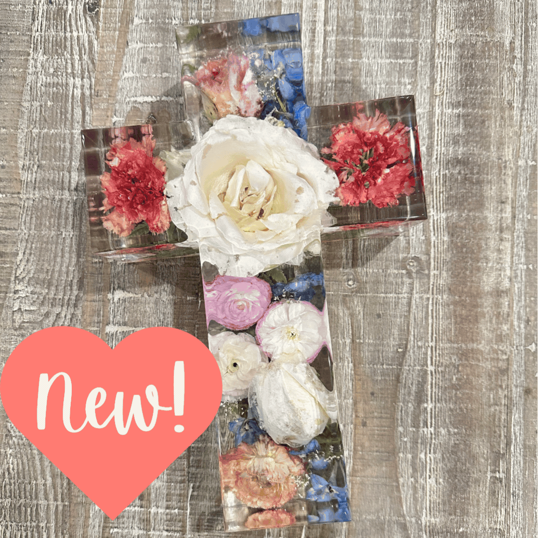 Flowers preserved in a resin cross