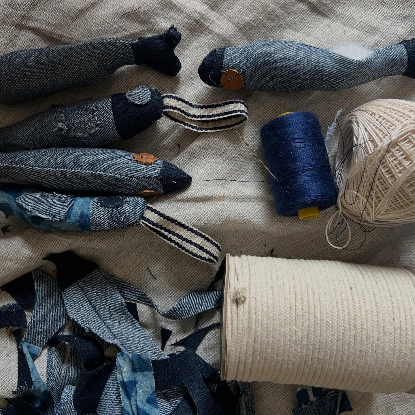 Lucky fish beginnings. Trying out a patterned I drew and using scrap indigo fabric. Not there yet.  #luckyfish #indigo #cherryjohnstonart