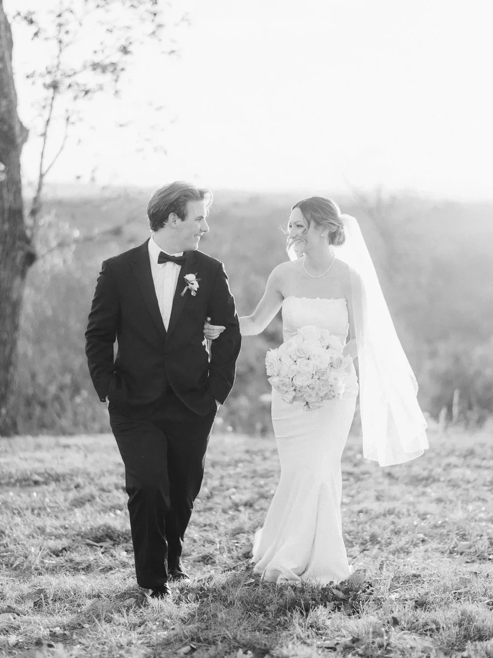 Bridal portrait with delicate pink and white lily bouquet at a Knoxville wedding venue