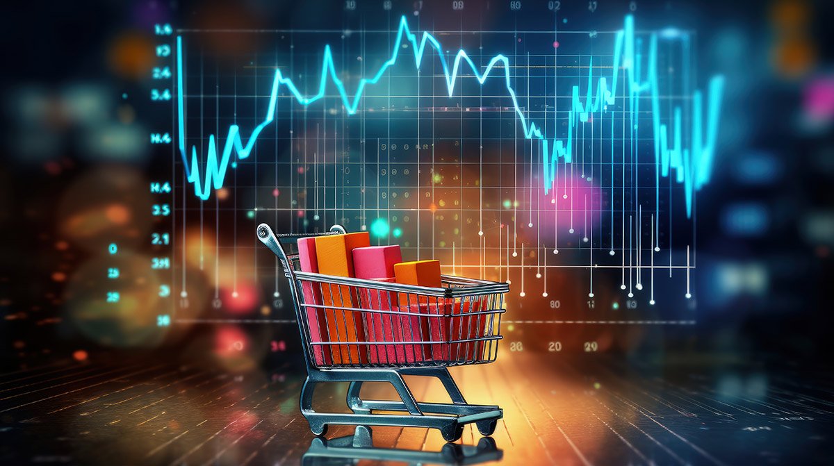 A shopping cart filled with colorful books in front of a digital stock market graph with fluctuating blue lines.