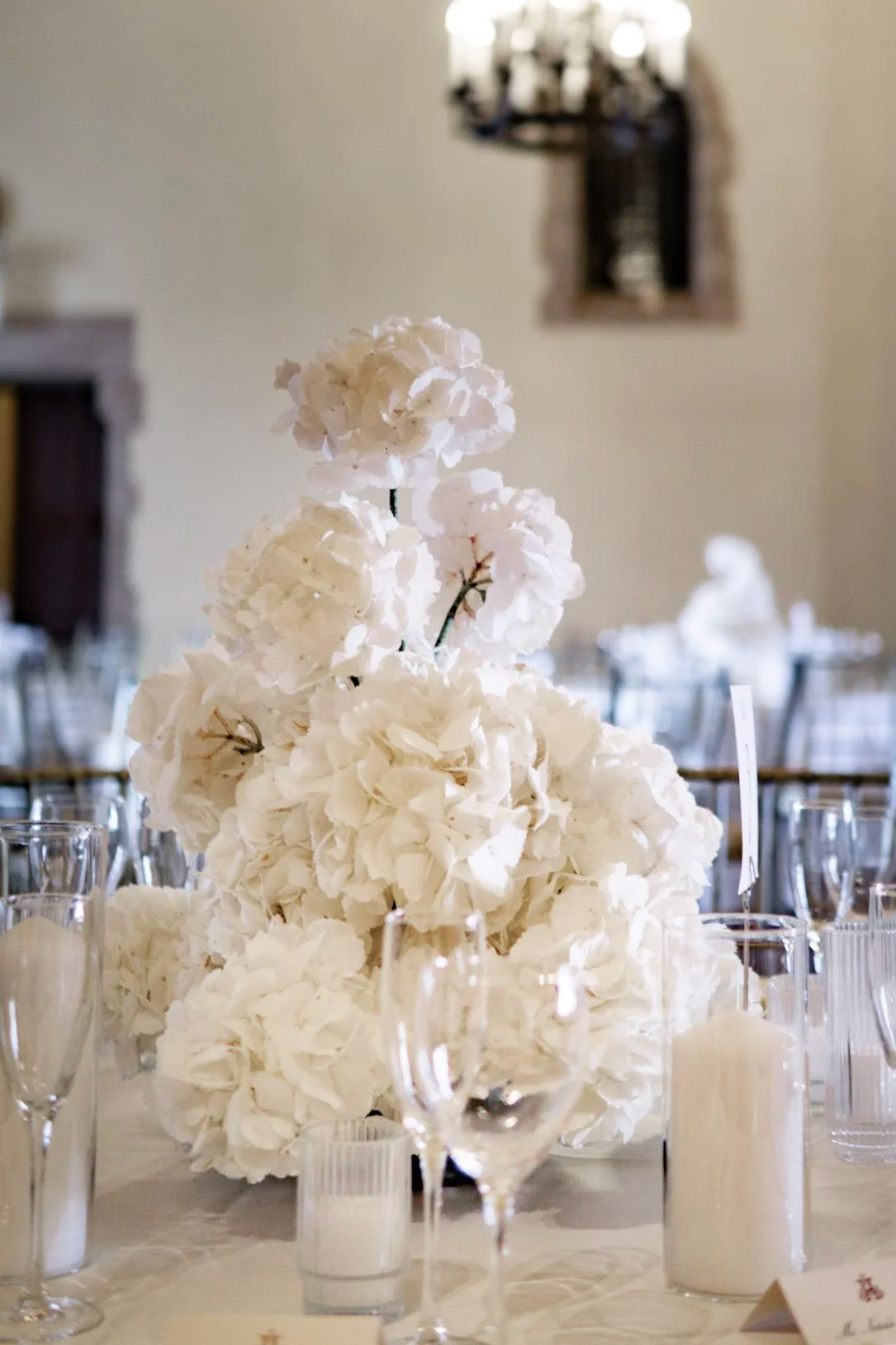 Wedding reception sculptural centerpiece of premium white hydrangeas