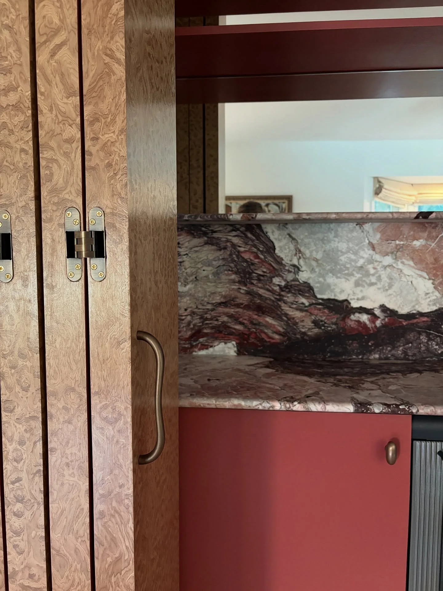 First snaps of the home mini bar in my sag harbor project 🍷🦪🐚🦞

I designed this to be the perfect home addition for a family who loves to entertain. When closed, it&rsquo;s a quiet statement piece wrapped up in Italian Carpathian Burl. But at win