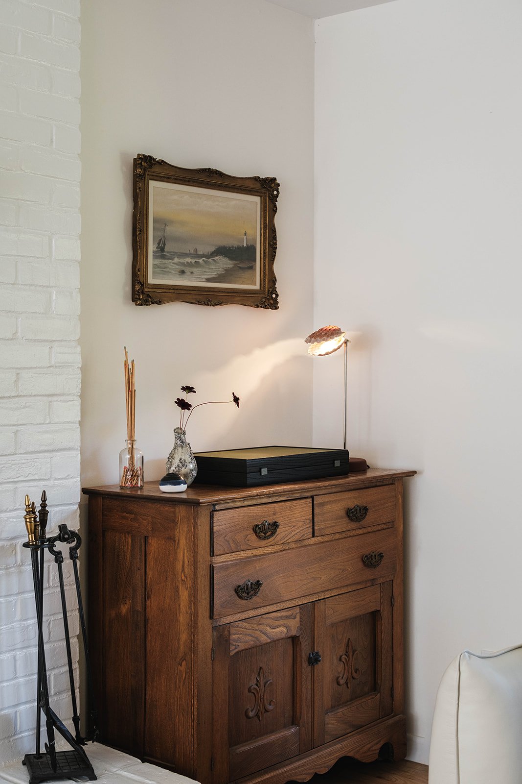 milieu-studio-interior-design-jersey-city-antique-sideboard-and-clam-table-lamp-sag-harbor.jpg