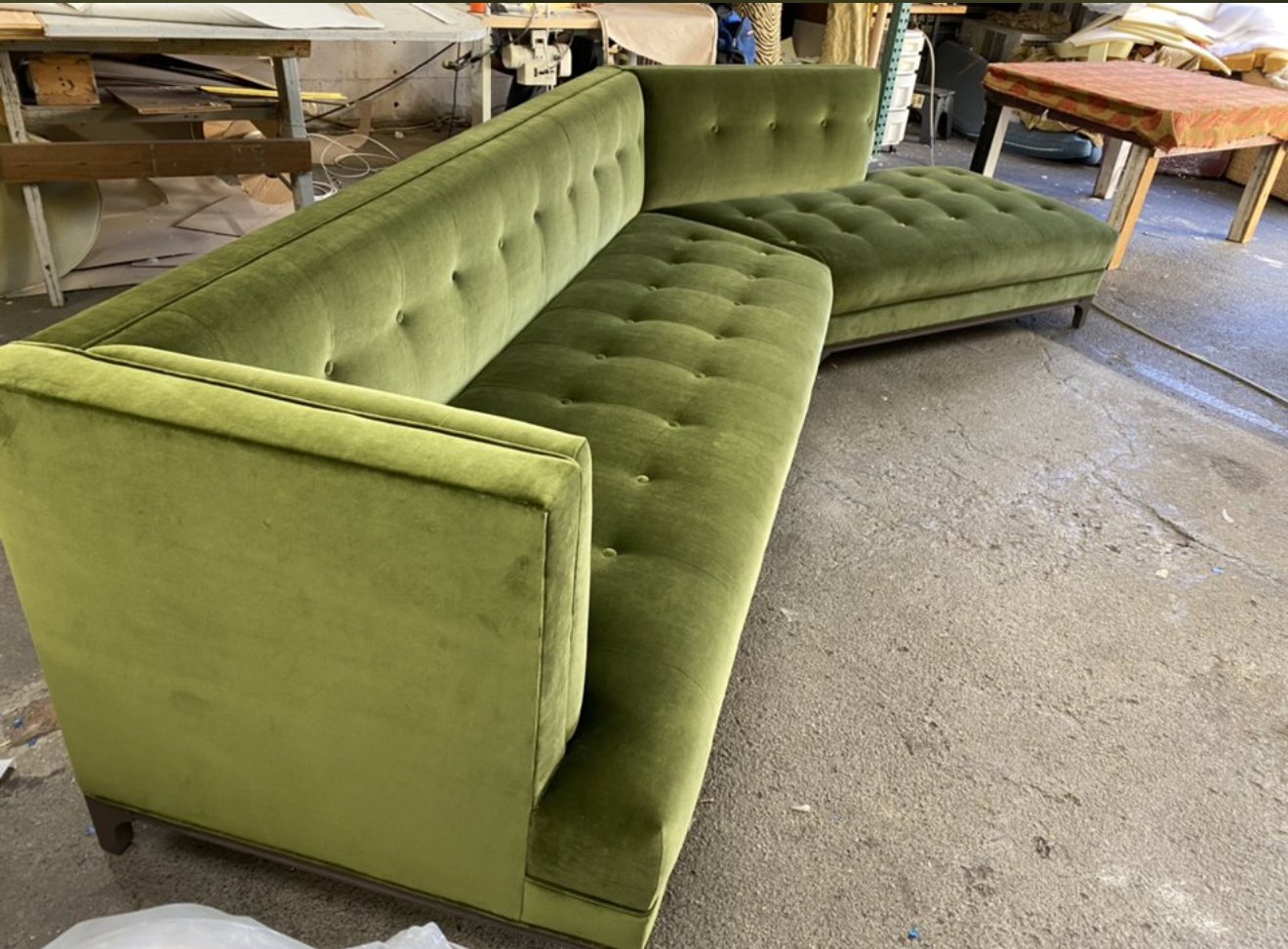 Custom made sofa for a recording studio made with a solid alder wood frame, no sag springs, high resilient foam and upholstered in a green luxury velvet. 