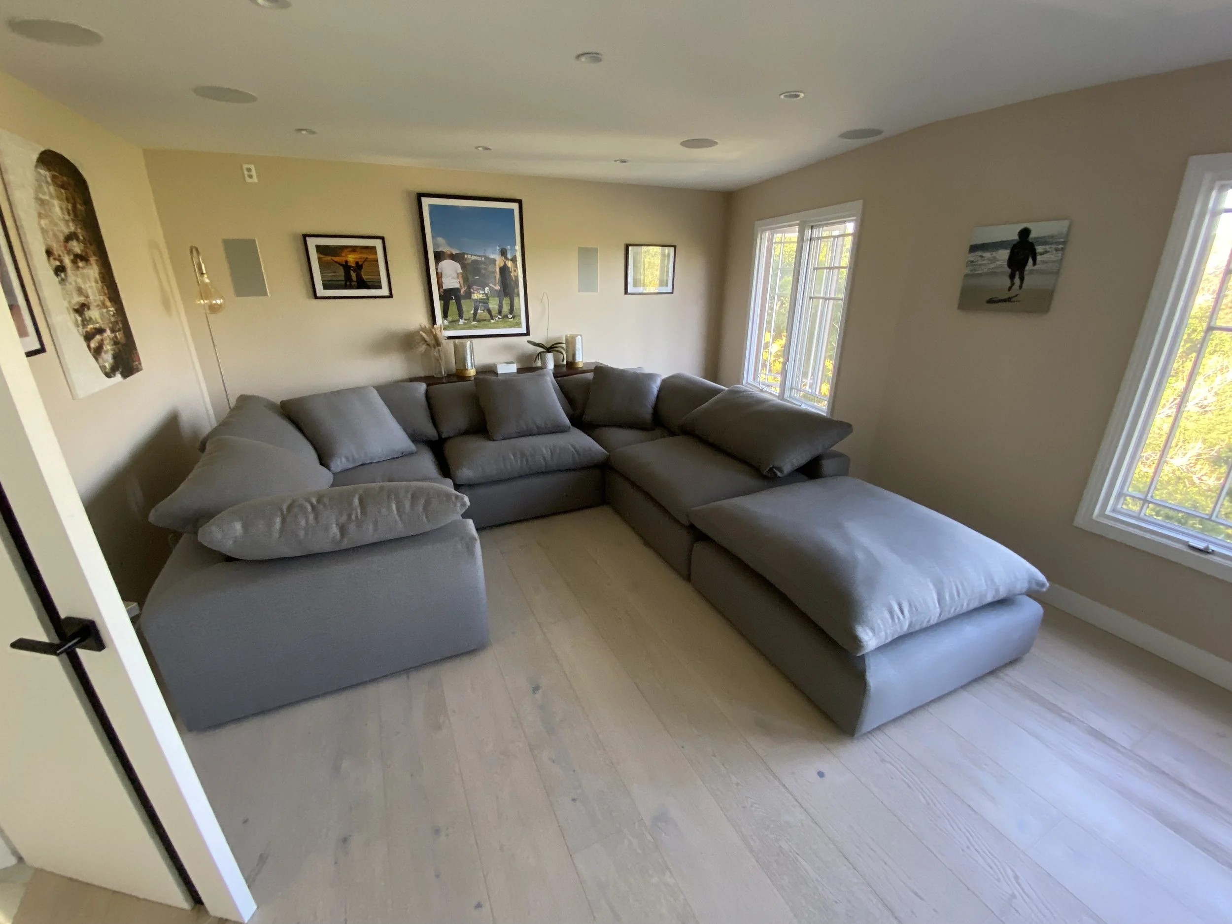 Cloud sofa reupholstered with grey tweed woven fabric with down and feather cushion envelopes. 
