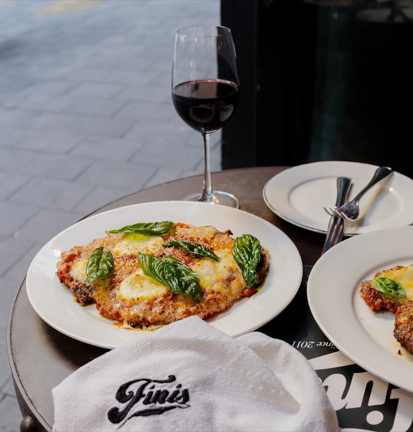 FINI’S FAMOUS CHICKEN PARM — the OG that started it all in Hong Kong Since 2011. Golden fried chicken cutlet, with our FINI’S red sauce and molten mozzarella, a truly NY Italian classic that’s been winning  hearts since day on
