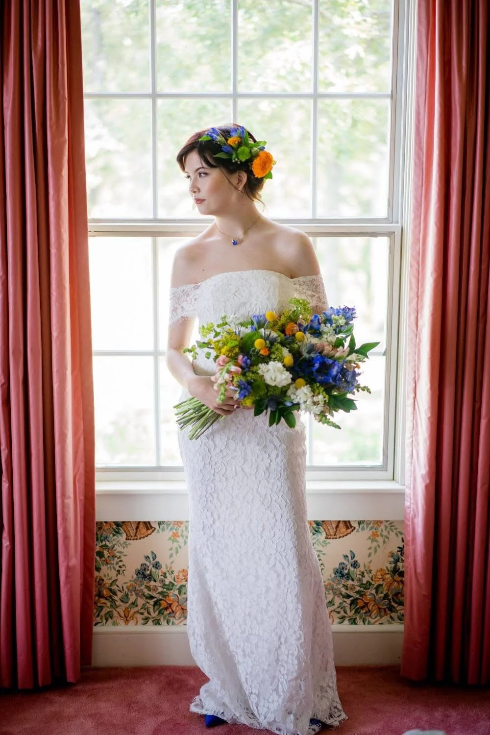 Brighton, Denver Colorado wedding the bride holding a locally grown flower bouquet