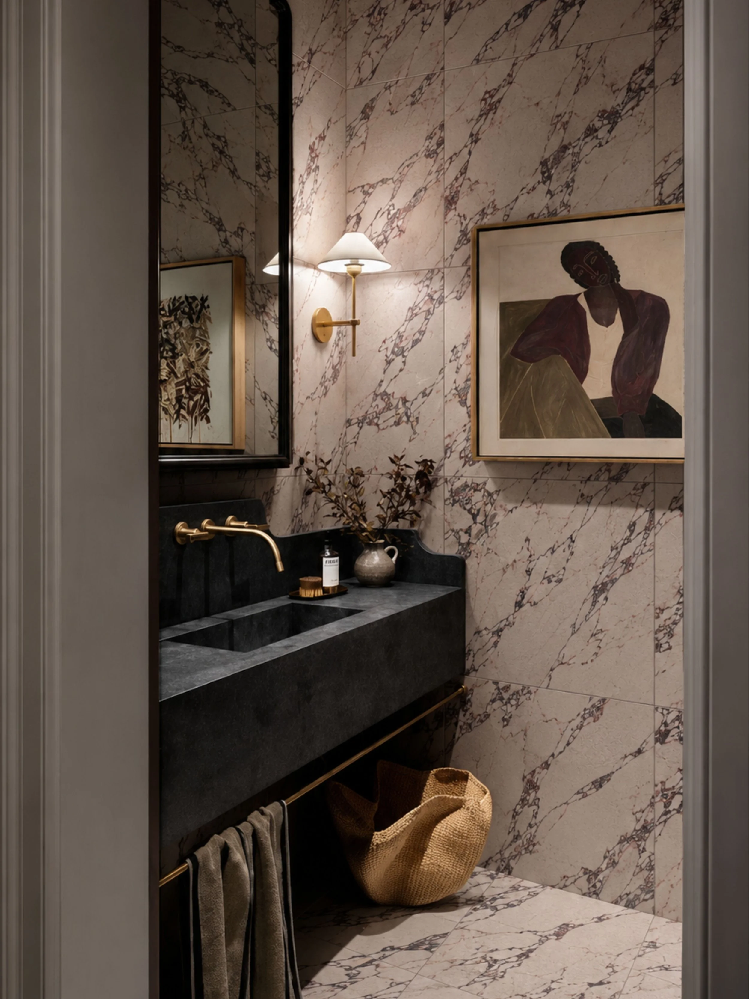 Bathroom featuring Arabesco Viola marble-look porcelain tiles across the walls and floor, with expressive burgundy veining, a dark stone-look vanity and brass tapware.