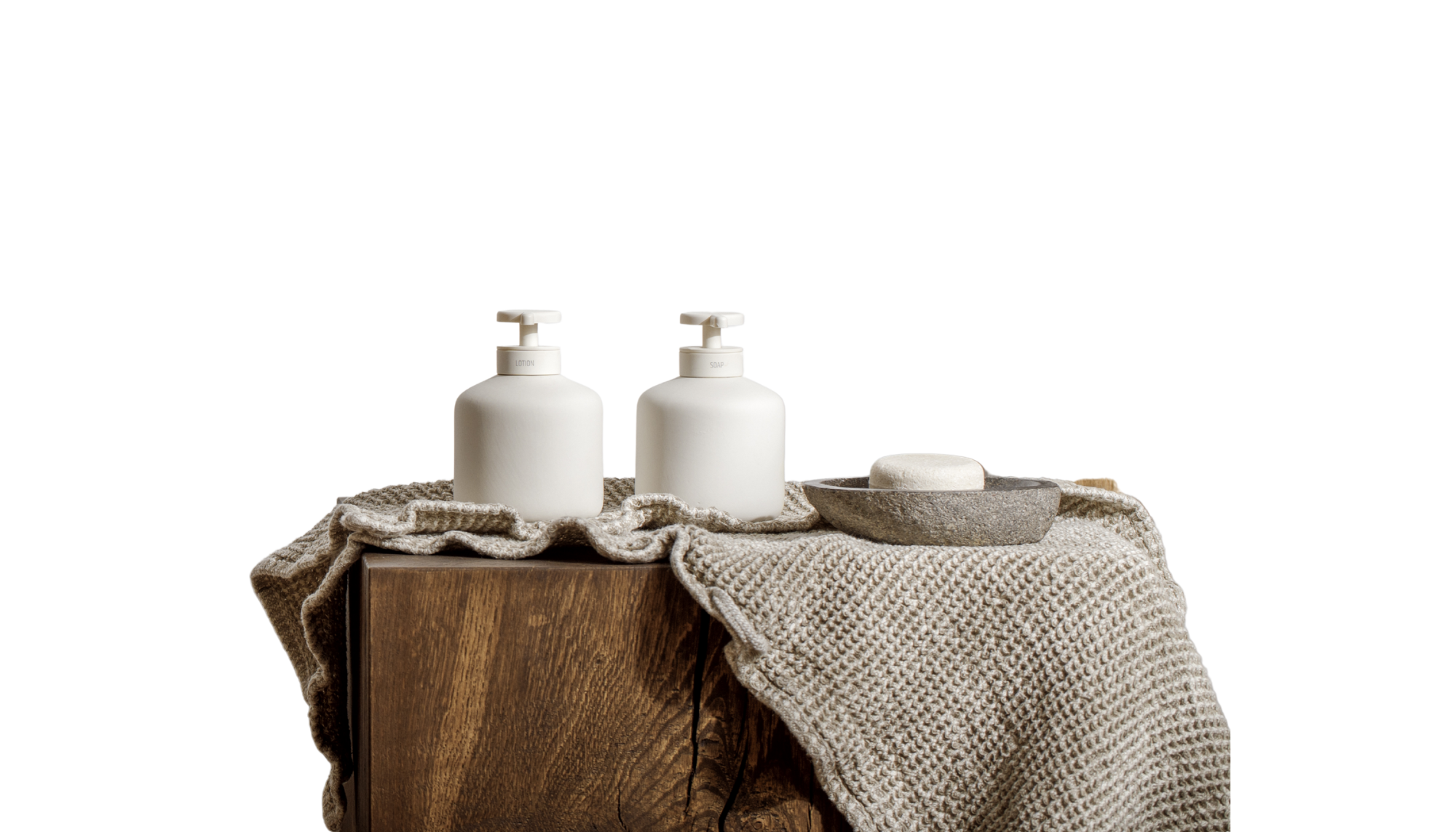 Travertine Classico porcelain tiles with warm beige tones, horizontal stone-like movement and natural-looking surface pitting, styled with bath accessories.