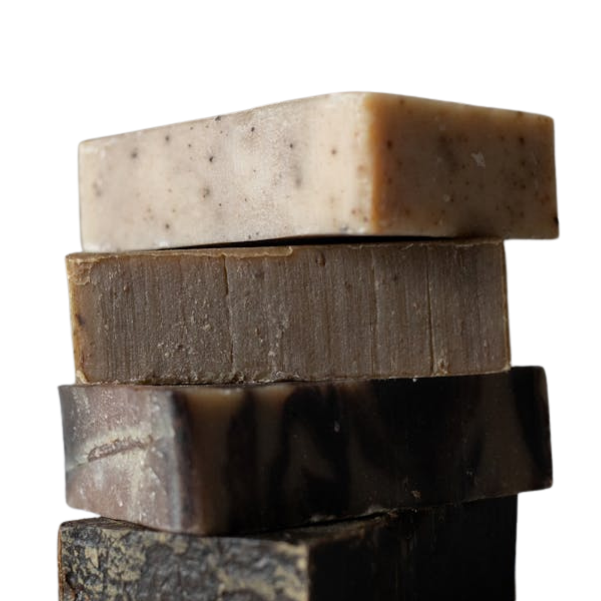 Travertine Classico Linea Linen porcelain mosaic tile banner featuring pale stone-look strips with vertical pitting, alongside a stack of neutral-toned soap bars.