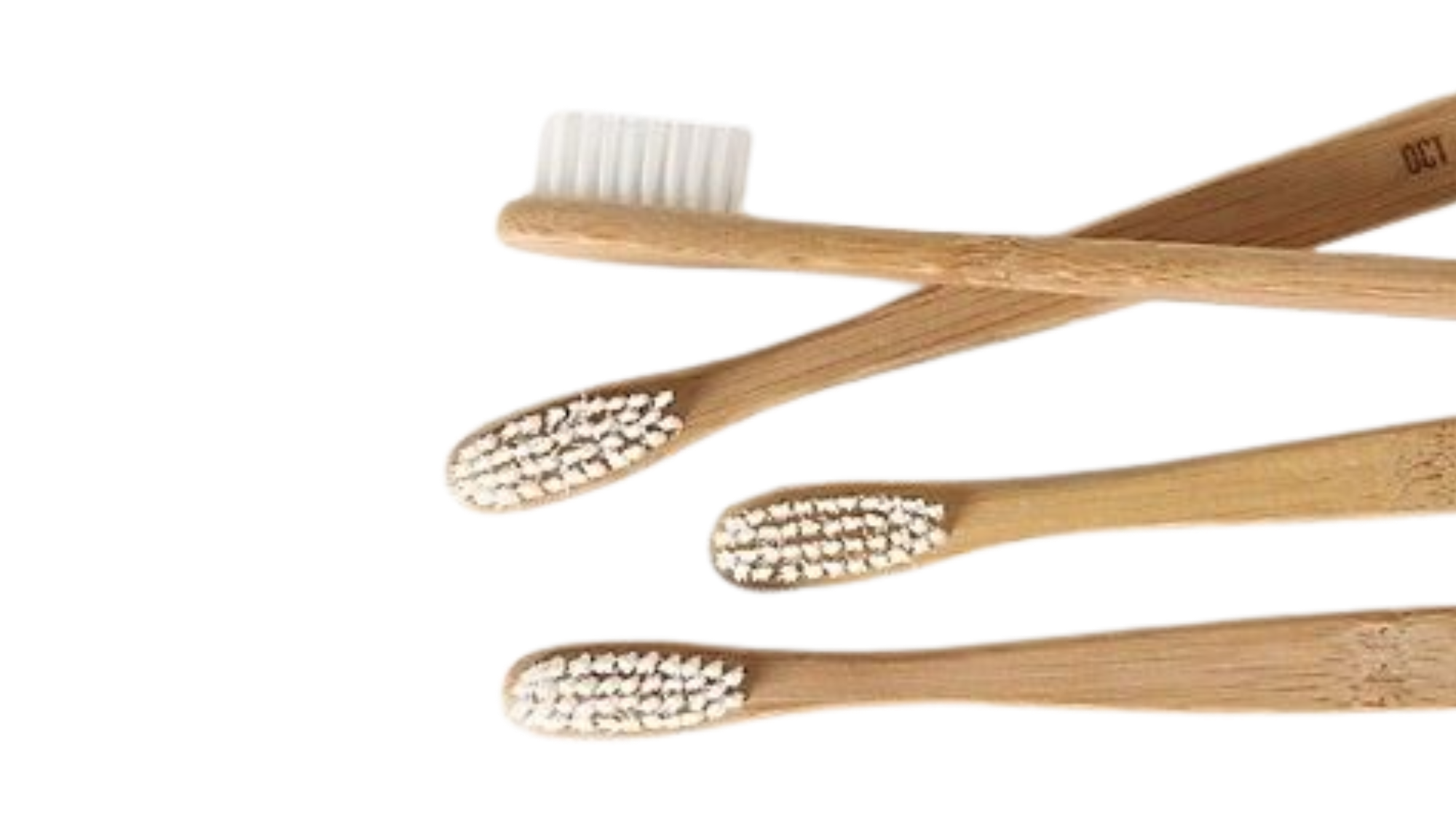 Limestone Tumbled Bianco porcelain mosaic tile banner featuring pale stone-look square tiles with softened edges, styled with bamboo toothbrushes.