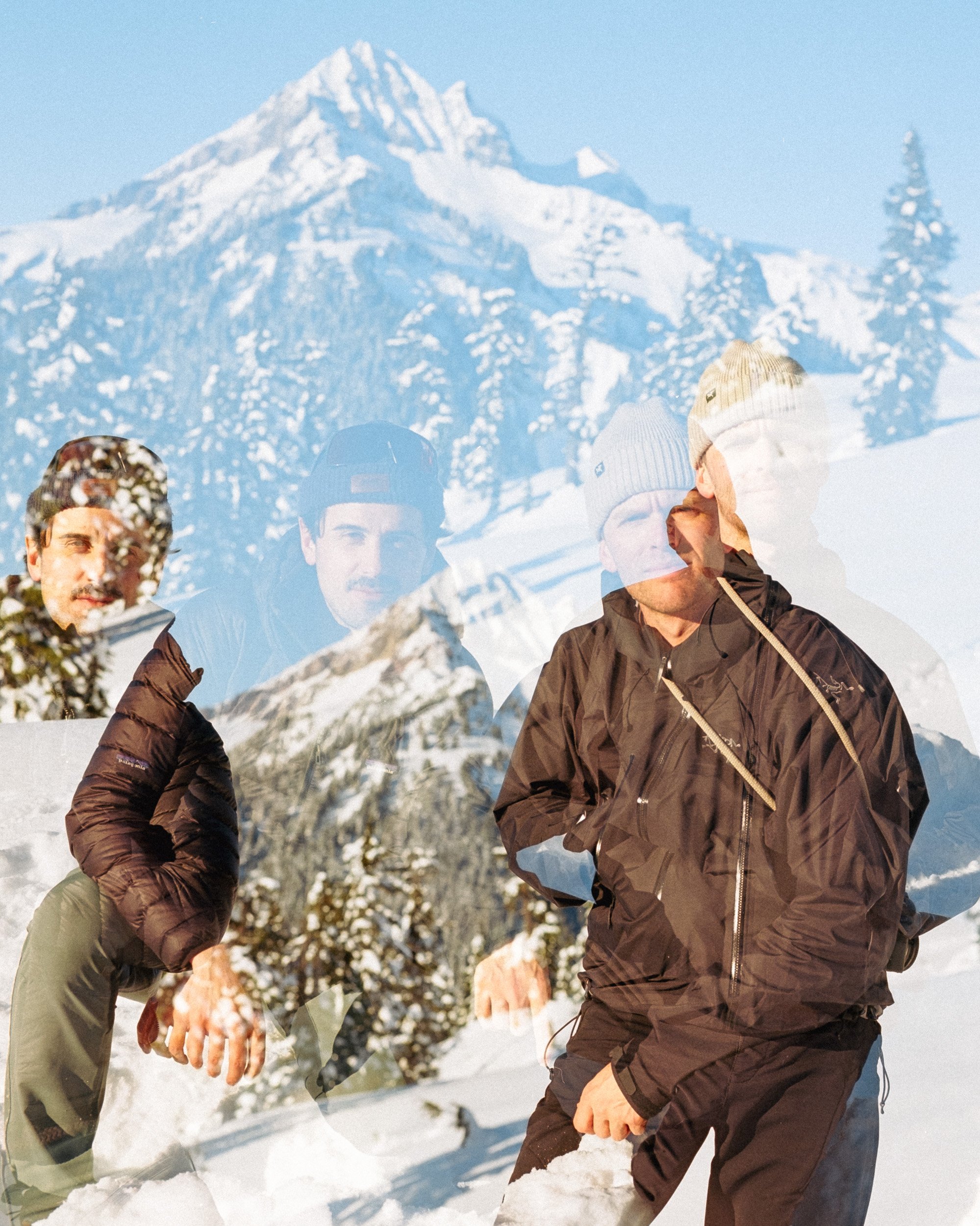 Double exposure photo of two people in winter clothing with a snowy mountain background.