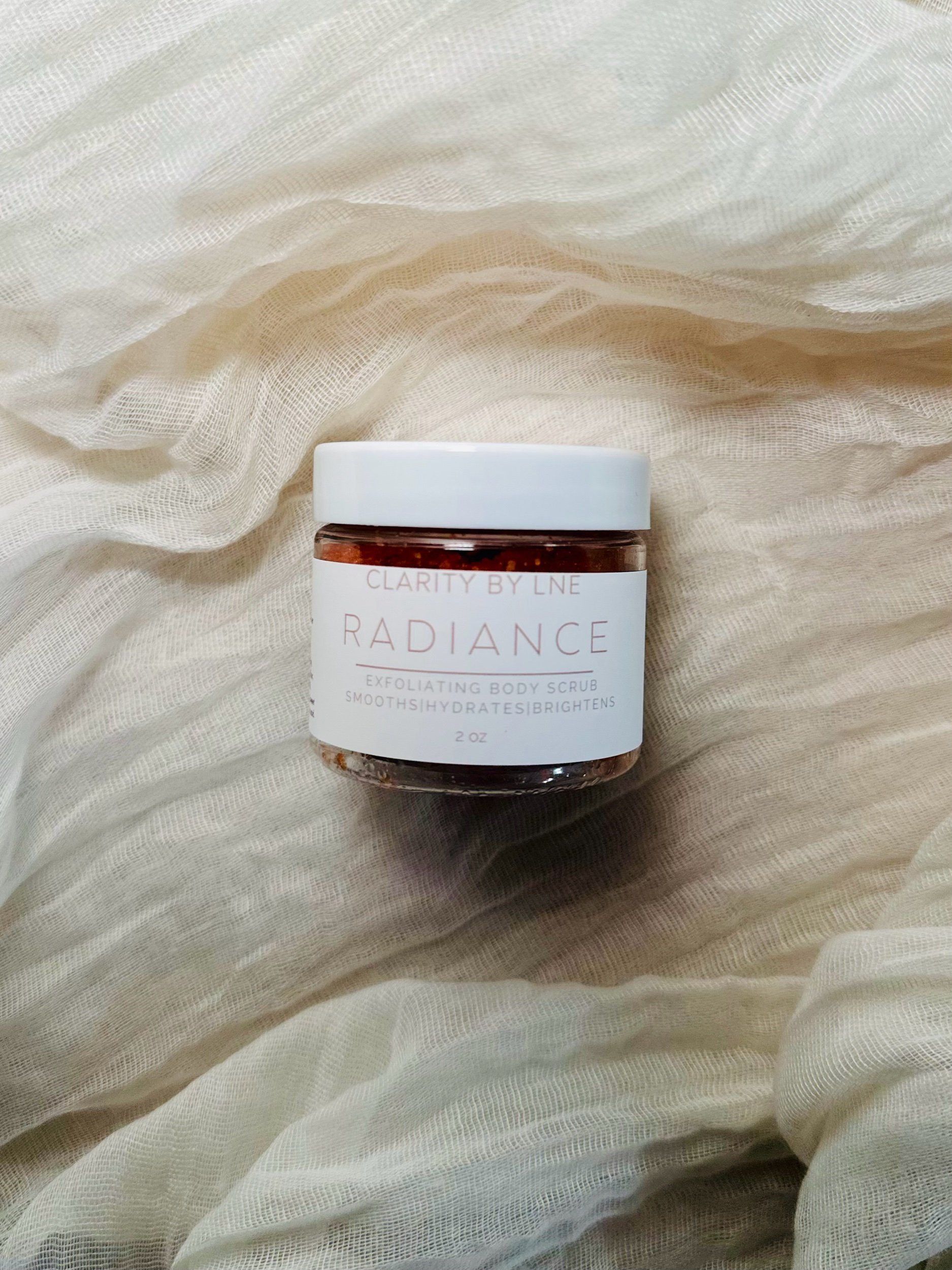 2 oz radiance scrub graphic.jpeg