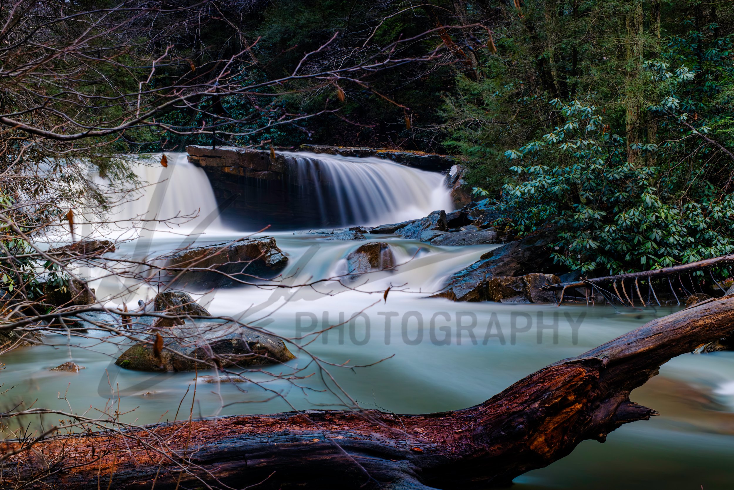 Serene Cascade Tranquil Waters Flowing Through Nature WM.jpg