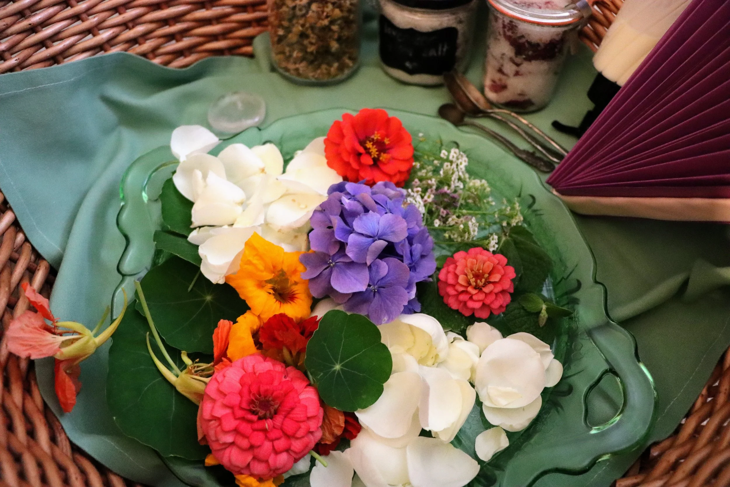 Closeup of some blooms from my garden to your blessing. Rose petals, hydrangea, nasturtium flowers and leaves, alyssum, zinnias and fresh mint.