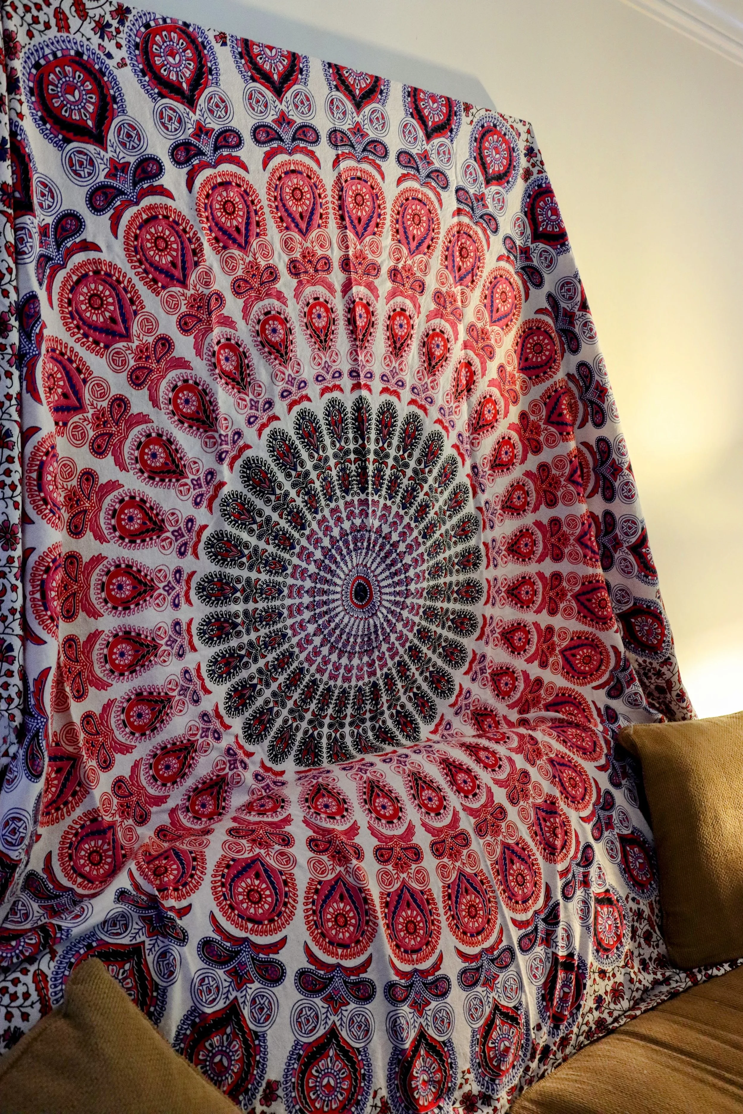 I bring tapestries and other decor to transform the space