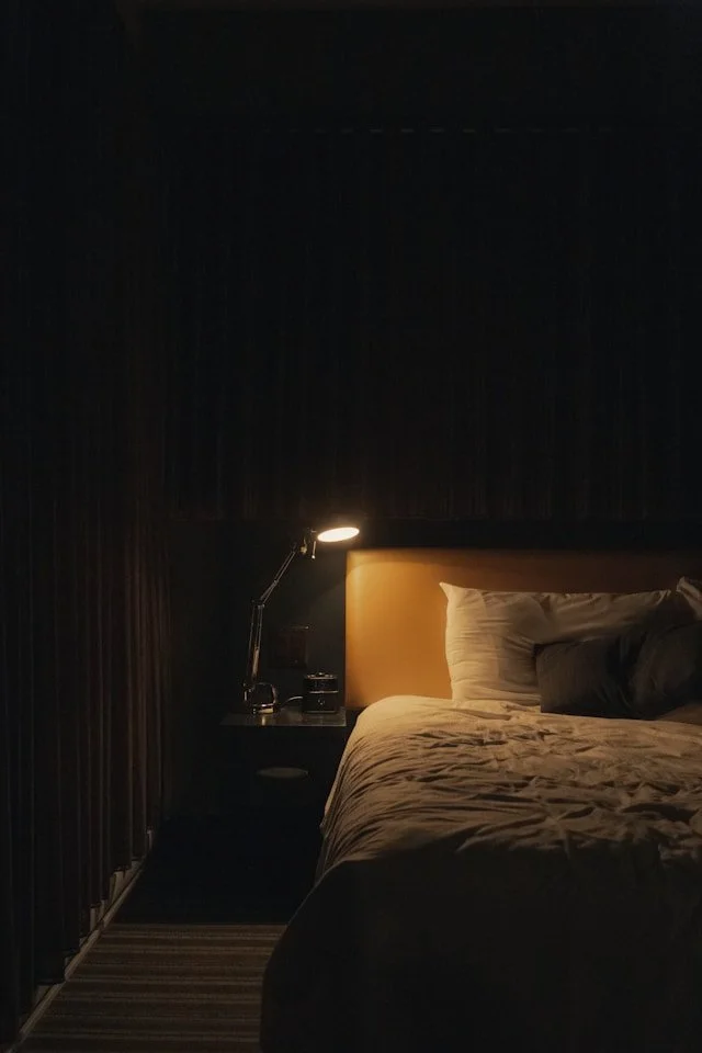 bedside light on conveying experience of insomnia.