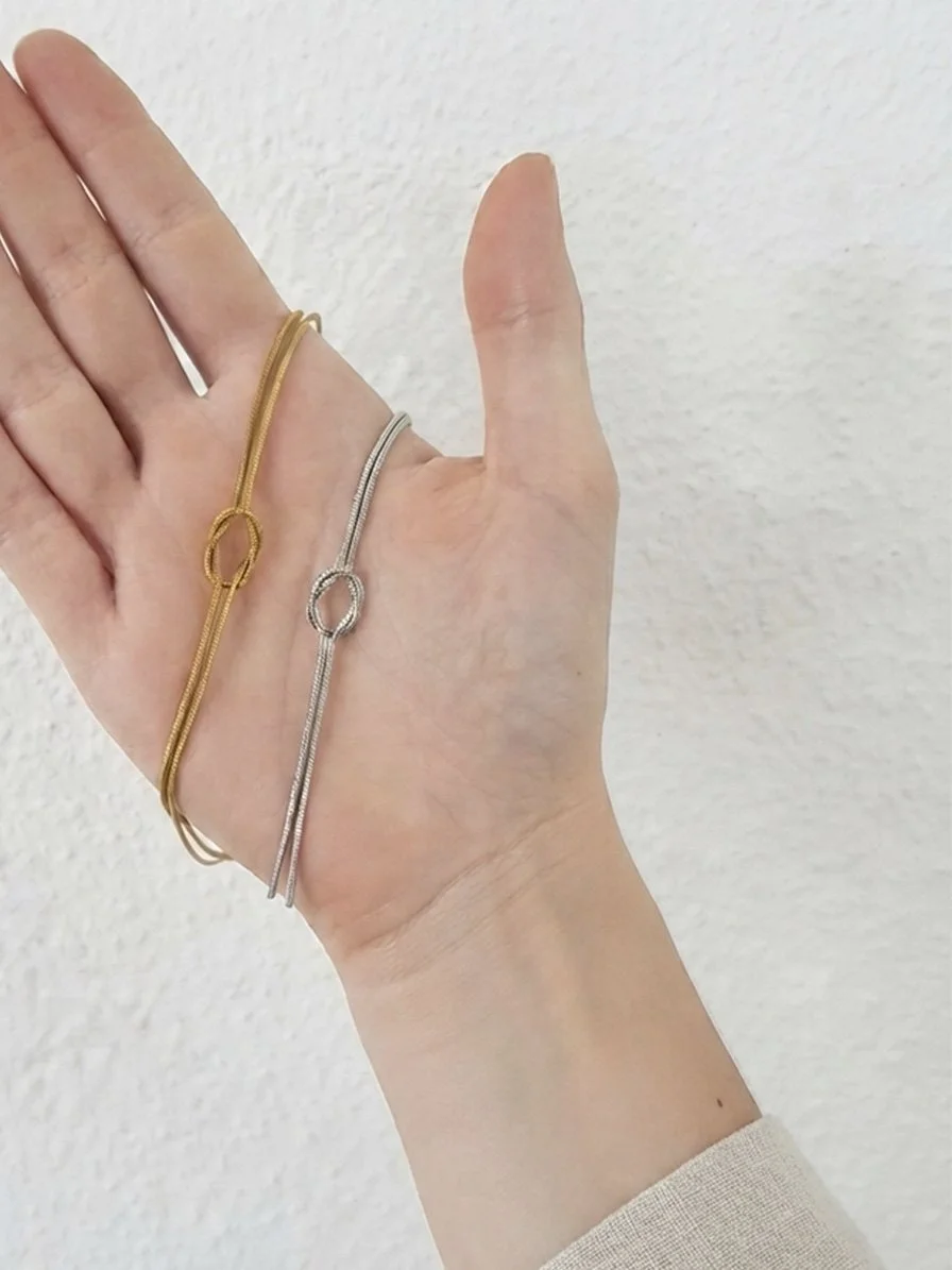 Tilly May- Knotted - Gold and Silver.jpg