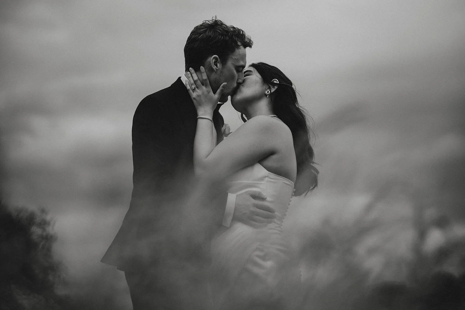 Meols Halls Wedding Photography showing a couple in the grass.