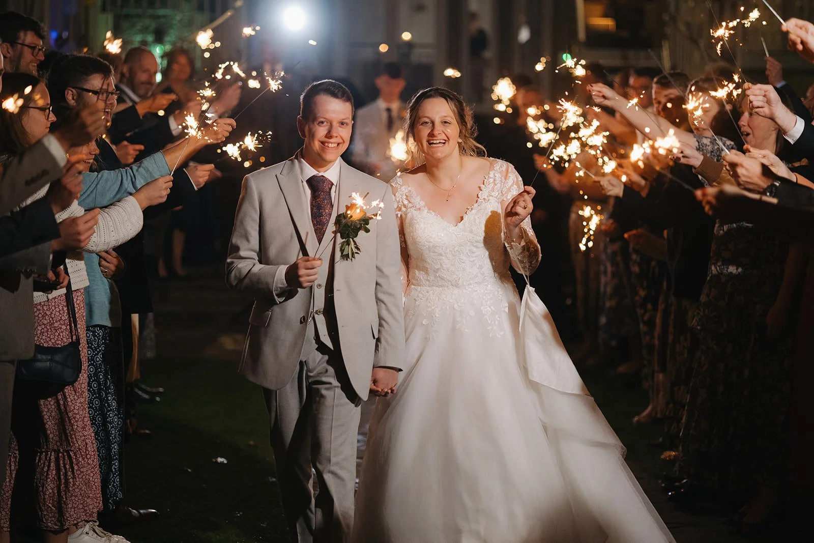 a wedding photograph at west tower showing a bride and groom with sparklers.