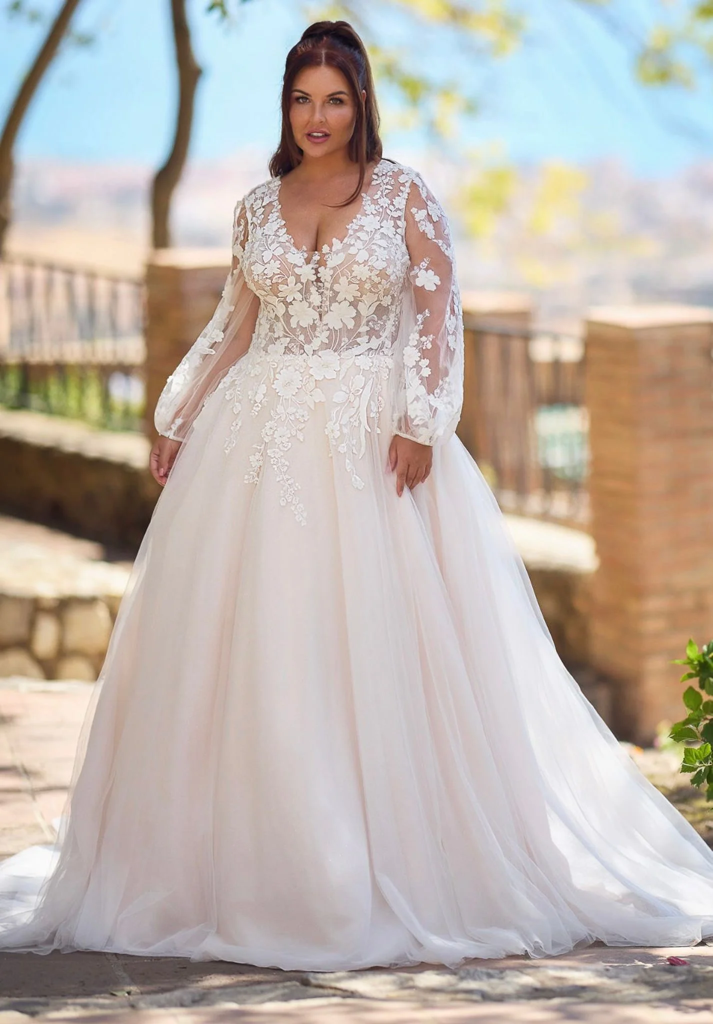 A bride showcasing a wedding dress from our Casa Blanca range at the Alexander Wedding Co in Formby near Liverpool City centre.