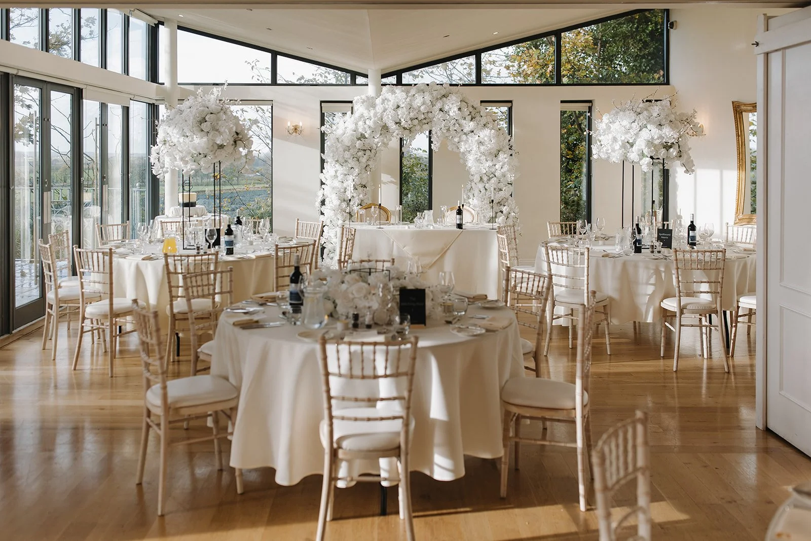 our white floral wedding styling decorating the ball room at West Tower, Lancashire.