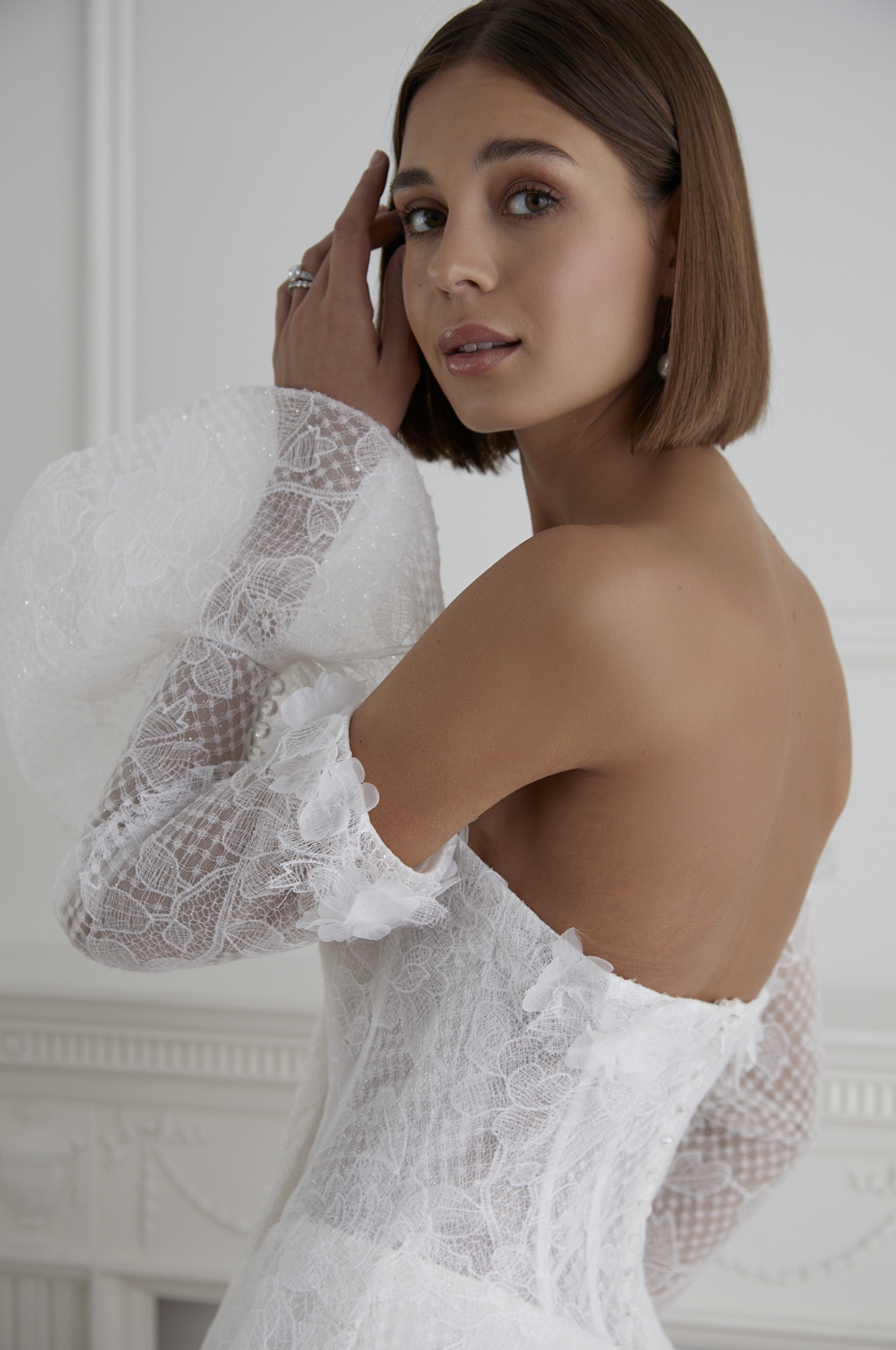 Bride trying on a wedding dress in a calm bridal boutique near Liverpool